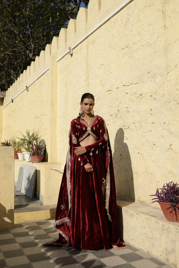 Hand Embroidered Maroon full sleeves Velvet Lehenga Set