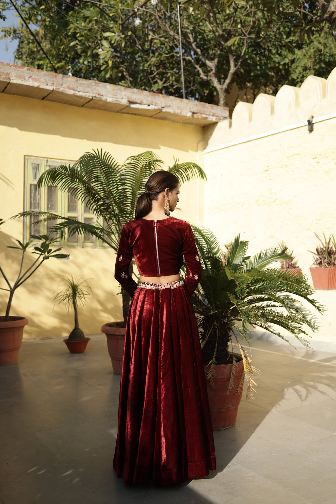 Hand Embroidered Maroon full sleeves Velvet Lehenga Set