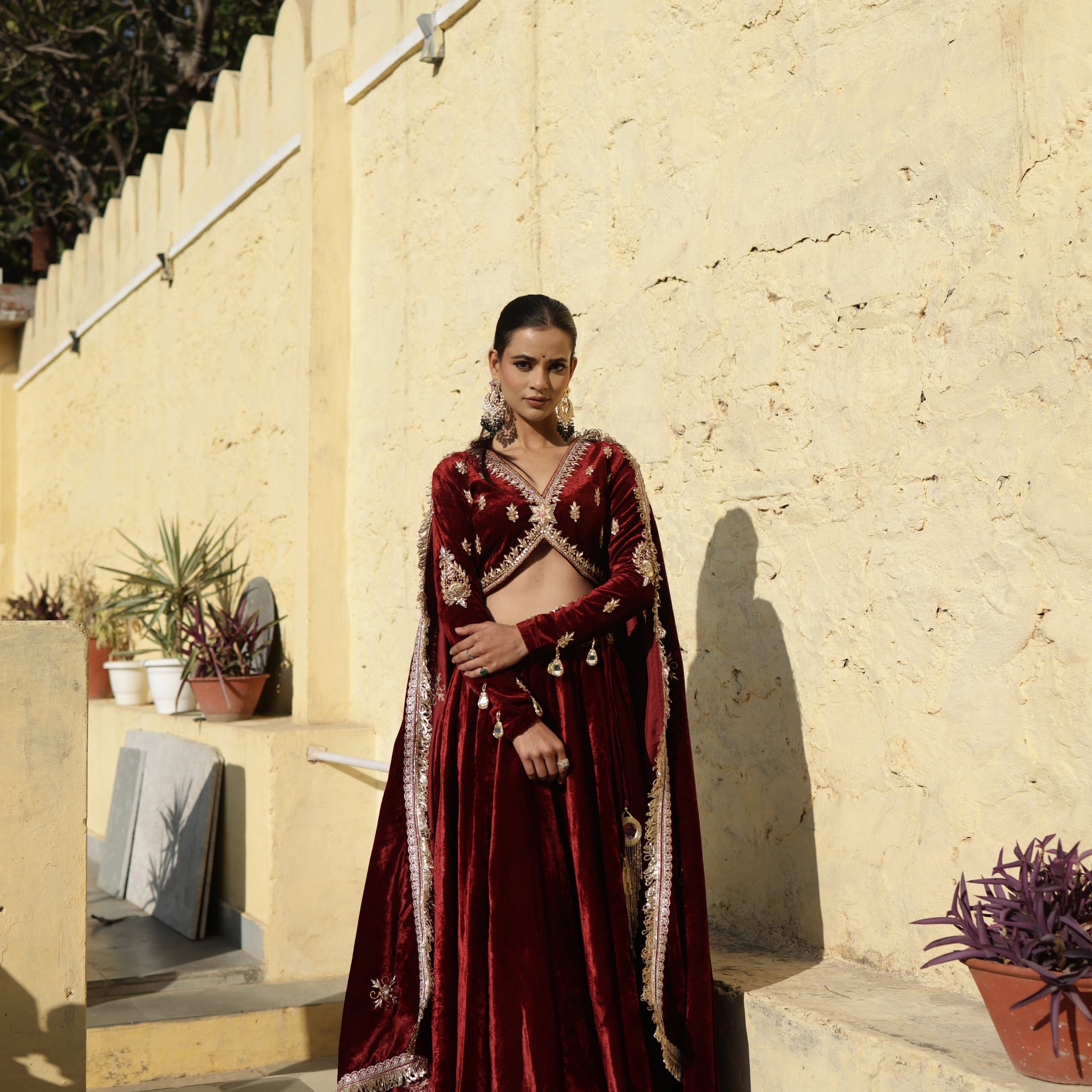 Hand Embroidered Maroon full sleeves Velvet Lehenga Set